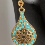 Taş sallanan vintage tasarım akşam küpeleri